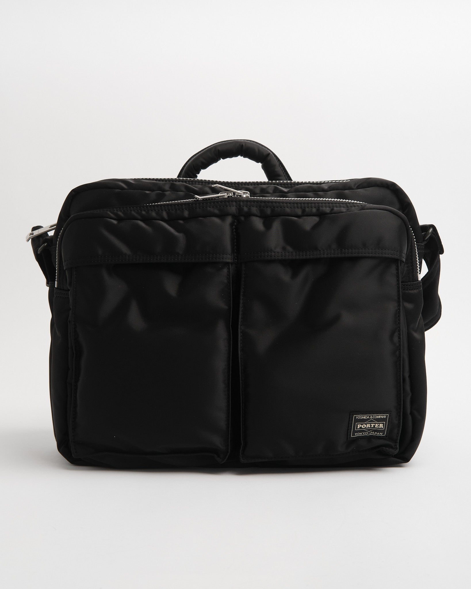 porter | New Tanker Sling Bag W Zip (XL) Black | meadow
