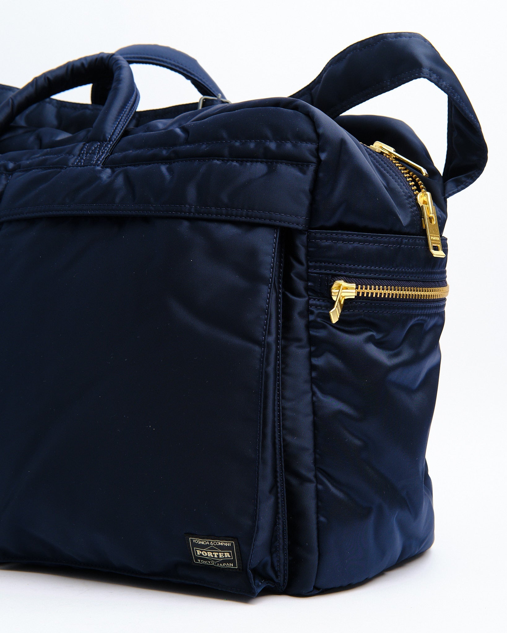 New Tanker Duffle Bag Navy by Porter by Yoshida - Meadow New Tanker Duffle Bag Navy by Porter by Yoshida - Meadow