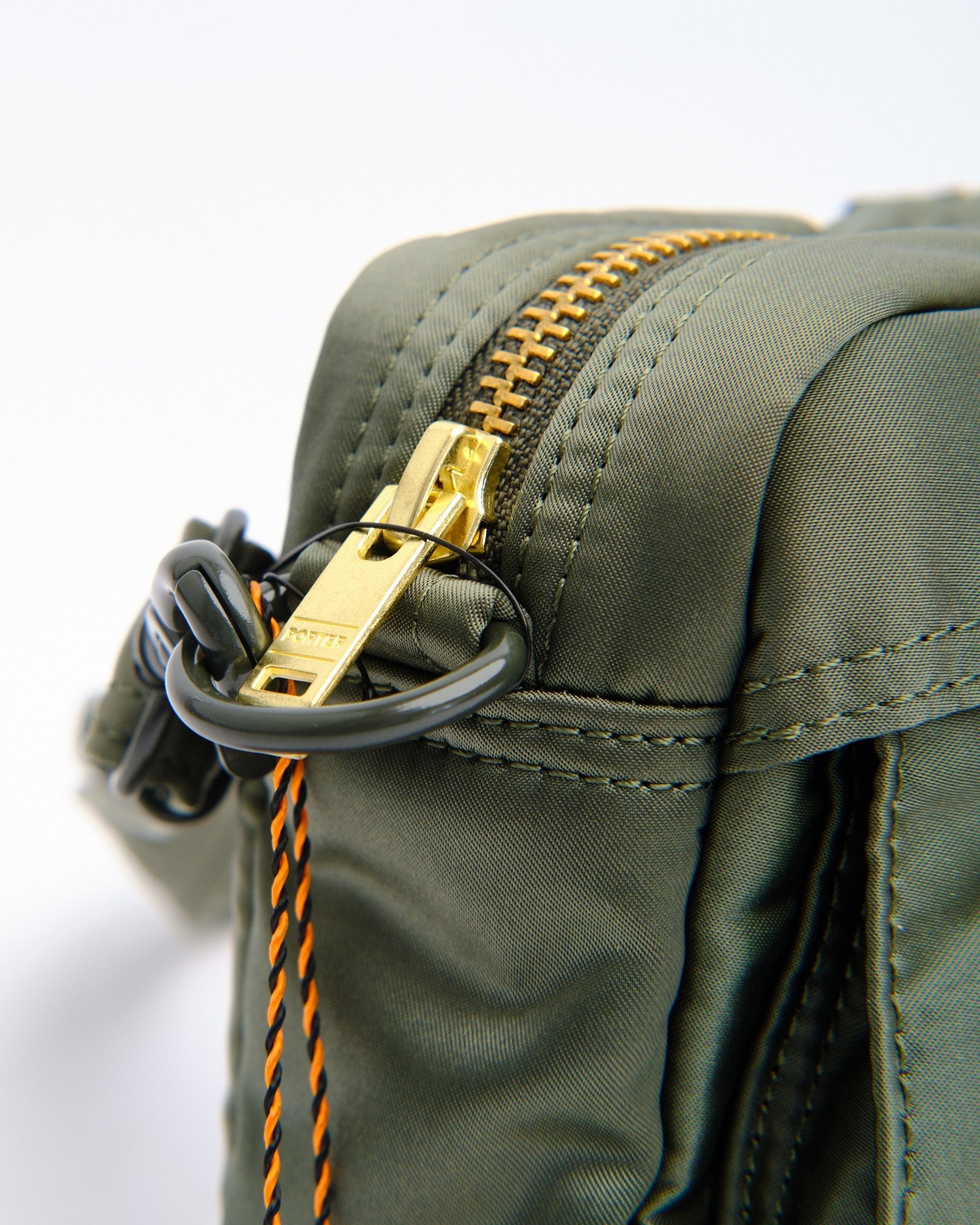 New Tanker Sling Bag Sage Green by Porter by Yoshida - Meadow