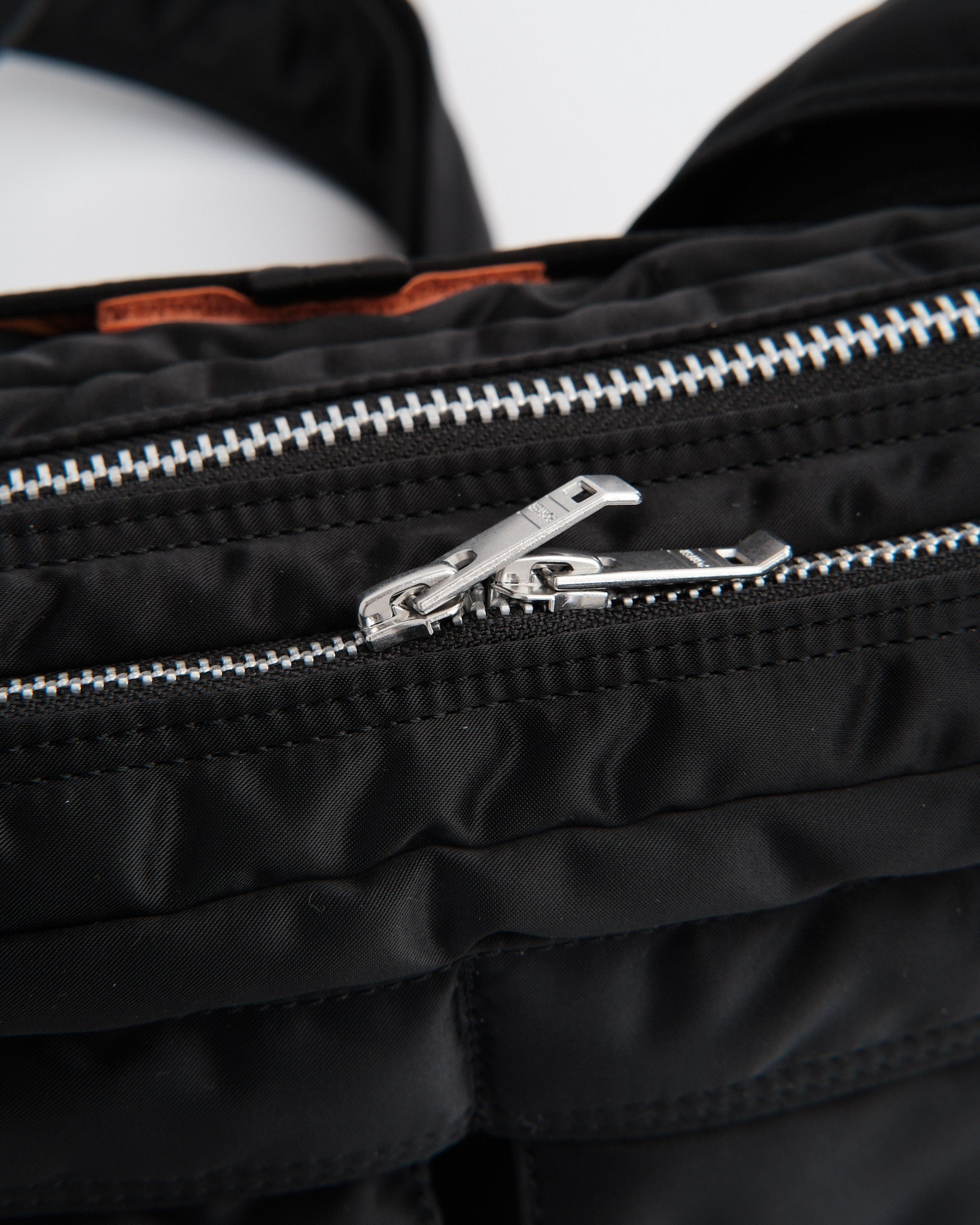 porter | New Tanker Sling Bag W Zip Black | meadow