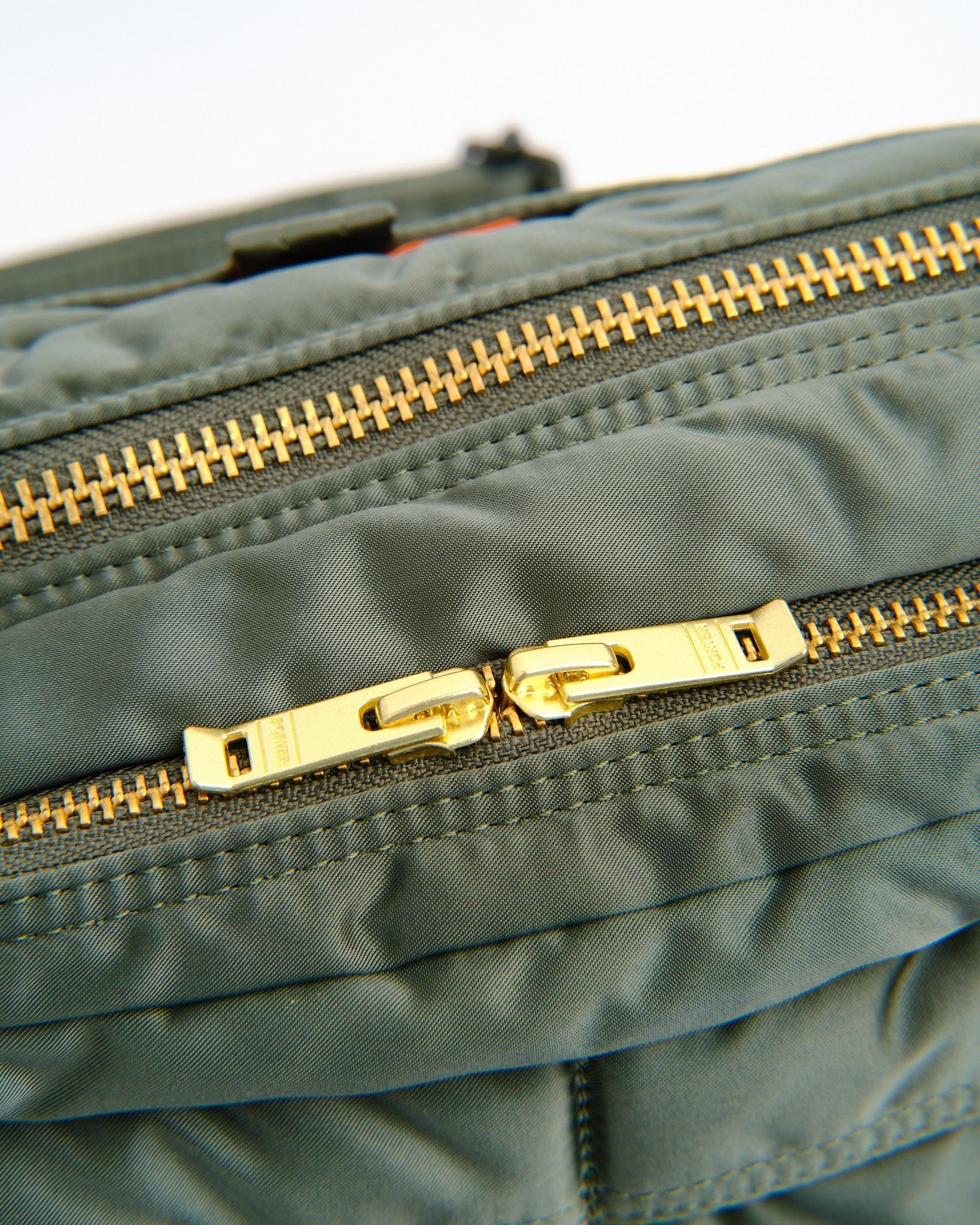 New Tanker Sling Bag W Zip (L) Sage Green by Porter by Yoshida