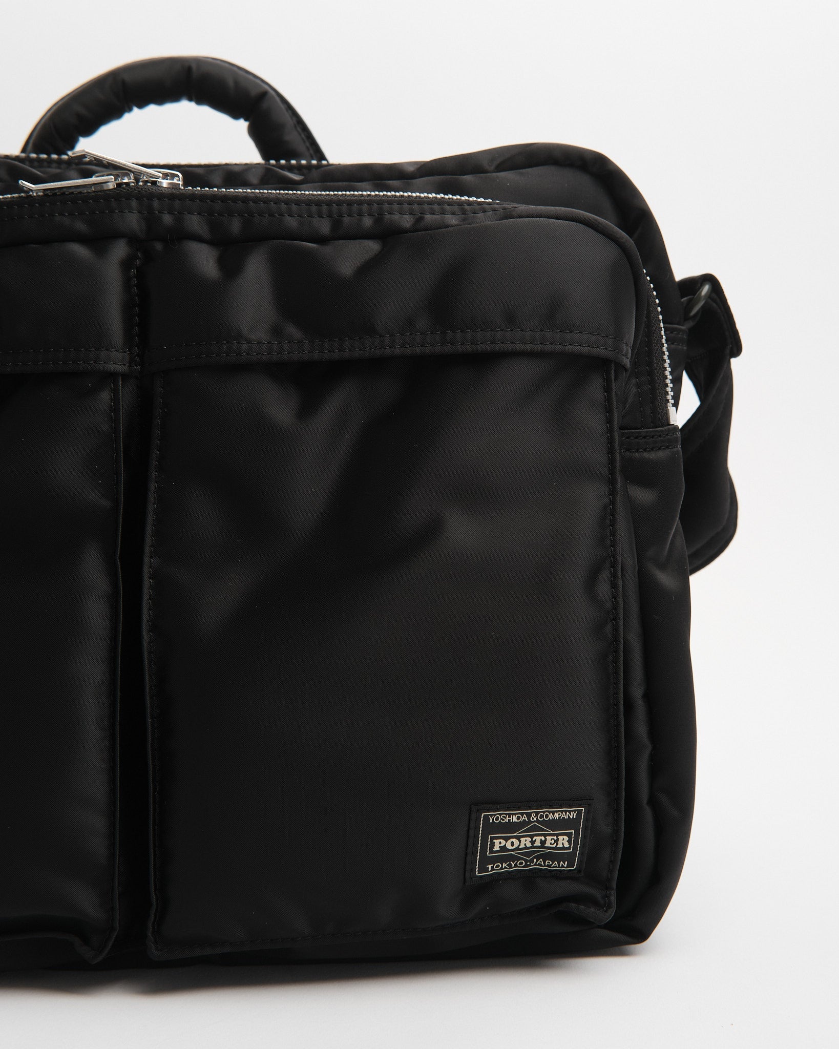 porter | New Tanker Sling Bag W Zip (XL) Black | meadow