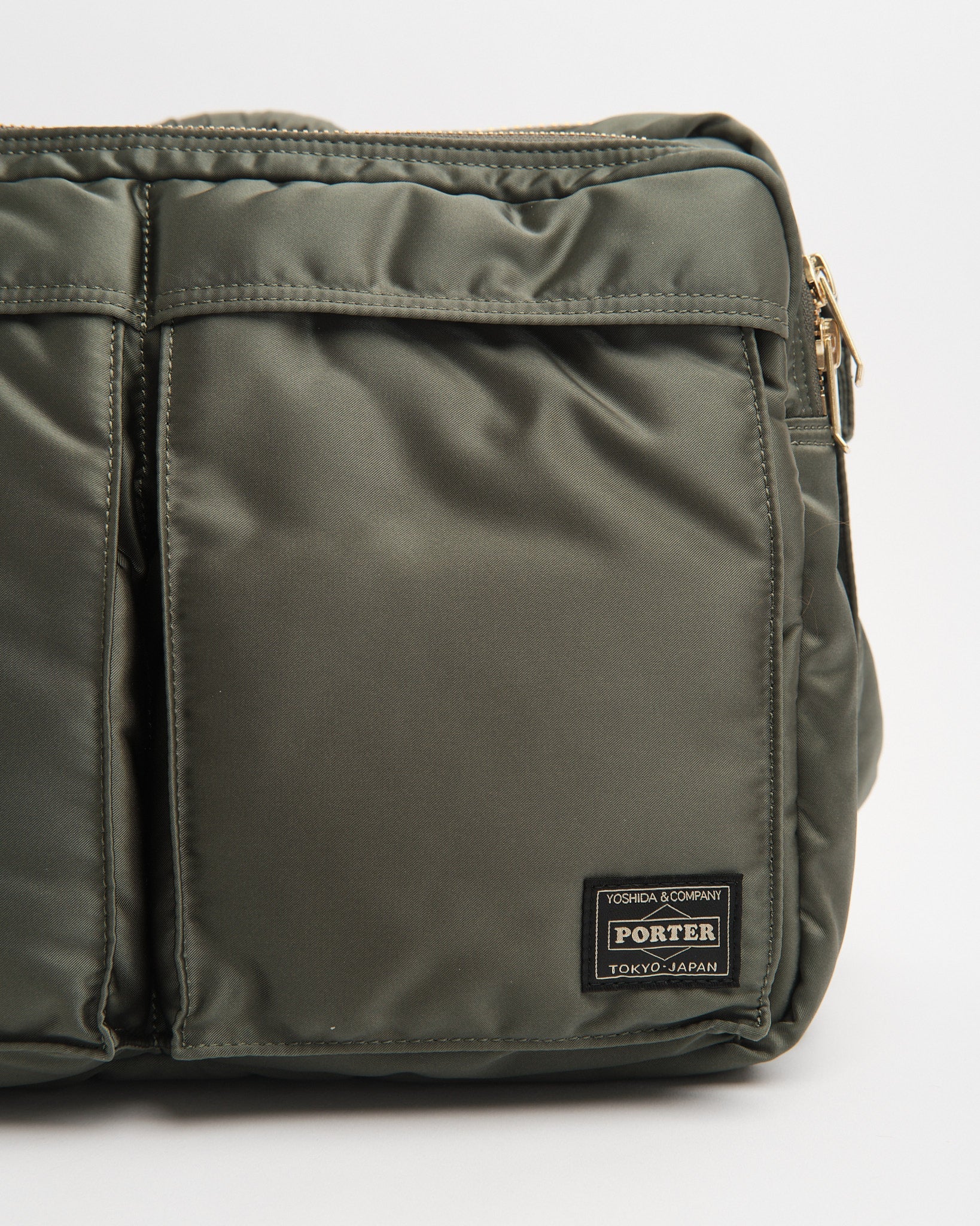 porter | Tanker Sling Bag W Zip (XL) Sage Green | meadow