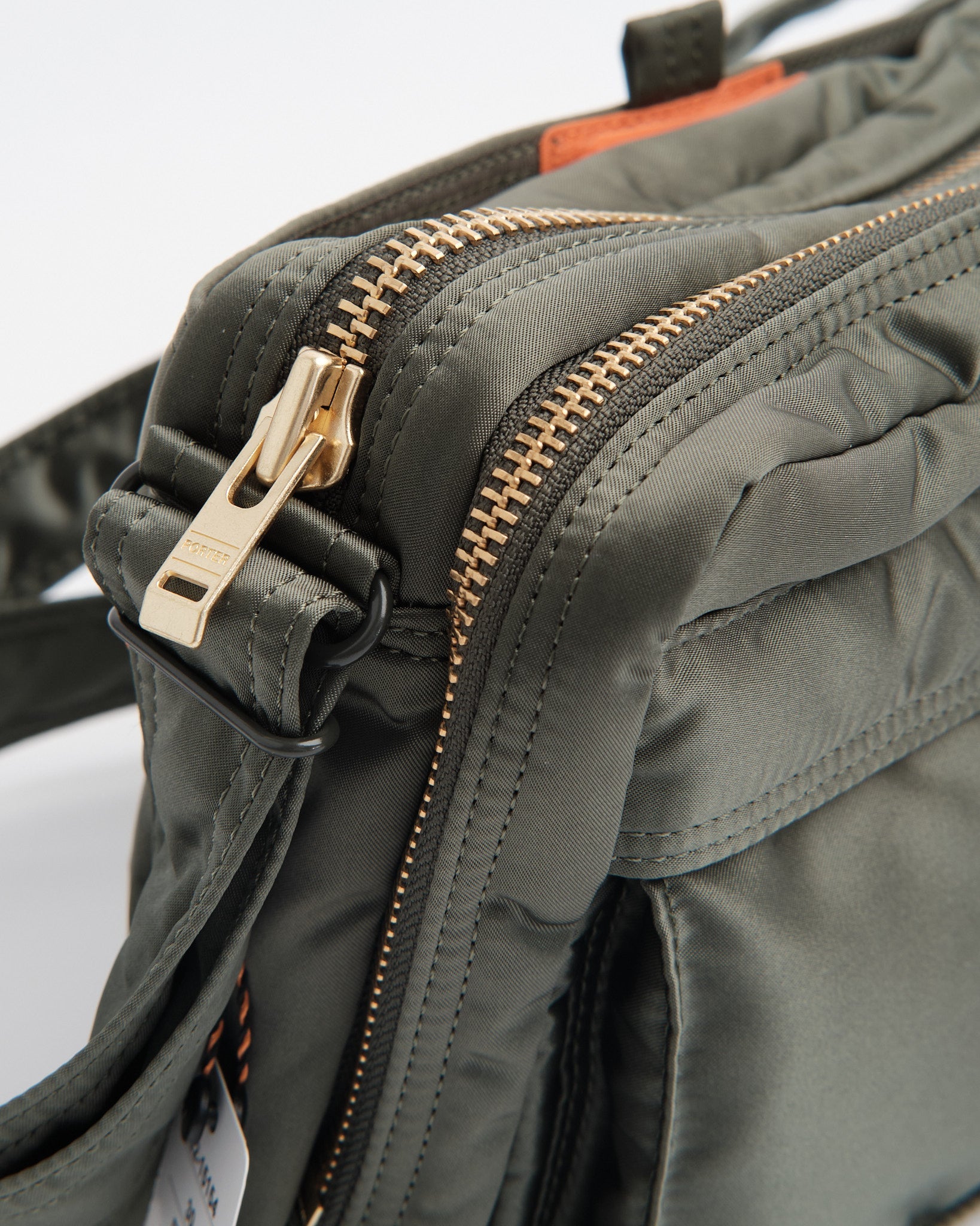 porter | Tanker Sling Bag W Zip Sage Green | meadow