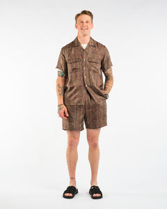 Beach Shorts Silk Batik Print Olive from Beams+ - photo №1. New Shorts at meadowweb.com