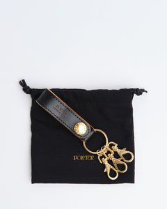 Film Key Holder Black from Porter by Yoshida - photo №1. New Bags at meadowweb.com